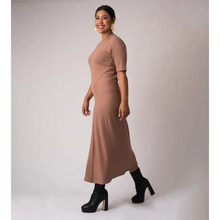 100 cotton rib dress with cuts that shape and add contour to the body 