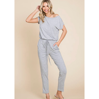 Jersey stretchy off shoulder jumposuit with short sleeves and taperd leg, ruched middle. 