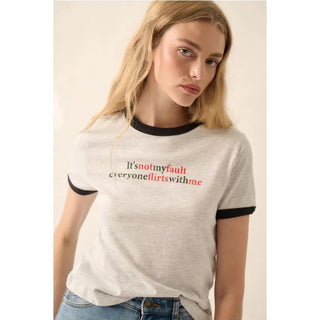 A French terry graphic tee with the following features:
Vintage-style "It's not my fault everyone flirts with me" text print.