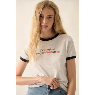 A French terry graphic tee with the following features:
Vintage-style "It's not my fault everyone flirts with me" text print.
