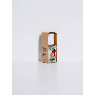 Candle in a decorative box with a flame design on a white background