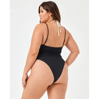 seam free one piece swimsuit with fused black and white halter tank neck