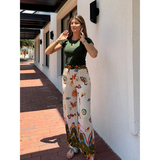 Hand crafted in Italy from soft fabric and designed with an elastic waist, these bohemian-style pants