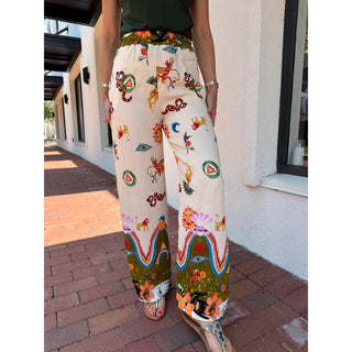 Hand crafted in Italy from soft fabric and designed with an elastic waist, these bohemian-style pants