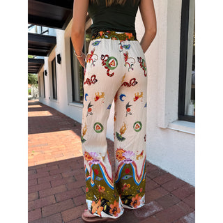 Hand crafted in Italy from soft fabric and designed with an elastic waist, these bohemian-style pants