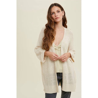 delicate and feminine open knit cardigan in cream color lightweight 