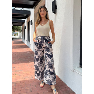 100% linen fabric handmade in Italy. Featuring a subtle, high-fashion-inspired safari print with lions, tigers, and trees