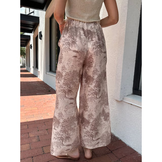 100% linen fabric handmade in Italy. Featuring a subtle, high-fashion-inspired safari print with lions, tigers, and trees