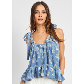 Denim peplum style tank blouse with floral design and tie shoulders. 