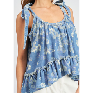 Denim peplum style tank blouse with floral design and tie shoulders. 