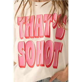 A distressed, garment washed graphic t-shirt with the following features:
Vintage-style "That's So Hot" text print.
Round neckline.
Short sleeves.
Dropped shoulder.
Torn and distressed detailing at neckline, cuffs, and hem.
Oversized fit.