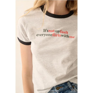 A French terry graphic tee with the following features:
Vintage-style "It's not my fault everyone flirts with me" text print.