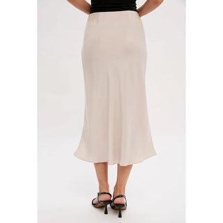 ​This sweet midi skirt is featured in a longline flowy silhouette, hidden side zipper closure, made with satin fabric. 