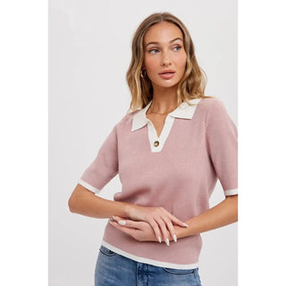  Lightweight cozy knit top featuring a v-neck with basic collar, contrast edge design, short sleeves and a relaxed-fit.