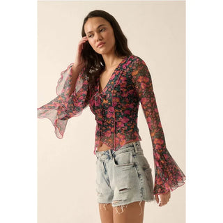 A floral mesh knit blouse 
