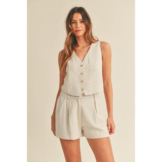 Solid linen mix button down vest and matching back elastic side pocket shorts set.