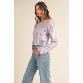 Long sleeve sequin crop top with shoulder pad detailing. Back invisible zipper. Lining.